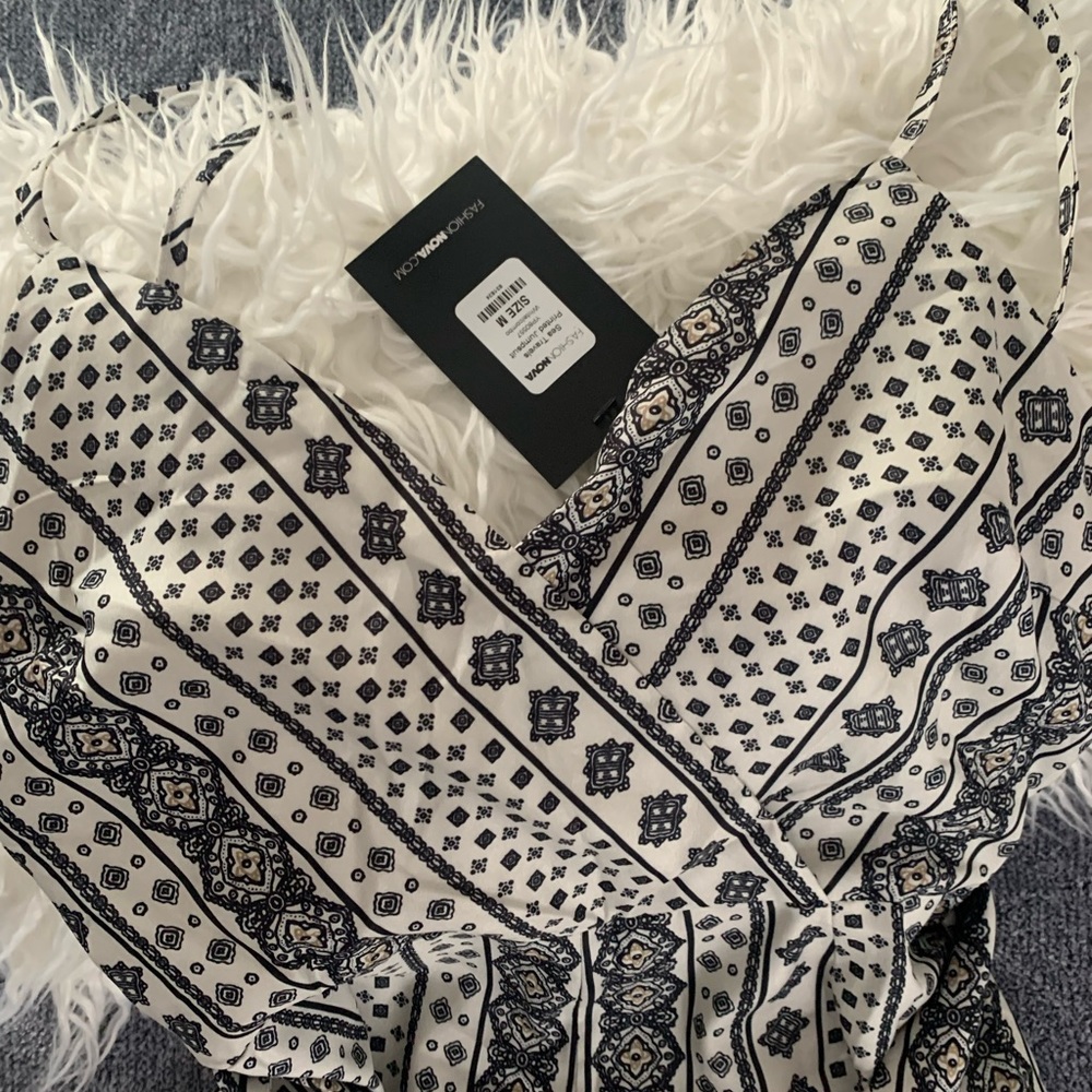 Size M white/combo jumpsuit